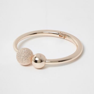 Rose gold tone ball cuff bracelet